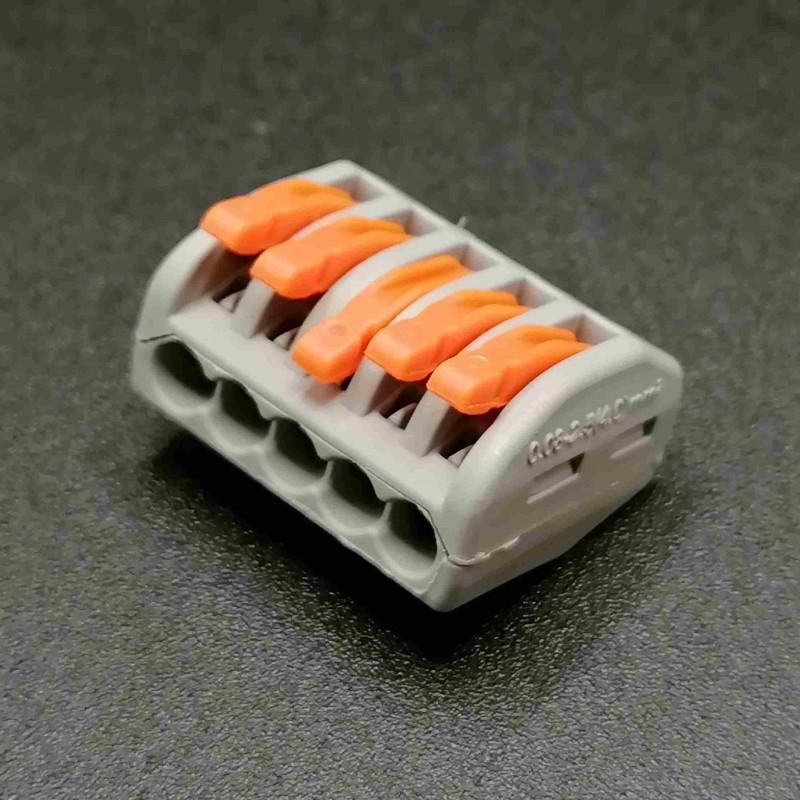 morsetto rapido cinque poli con leve arancioni per cablaggi elettrici