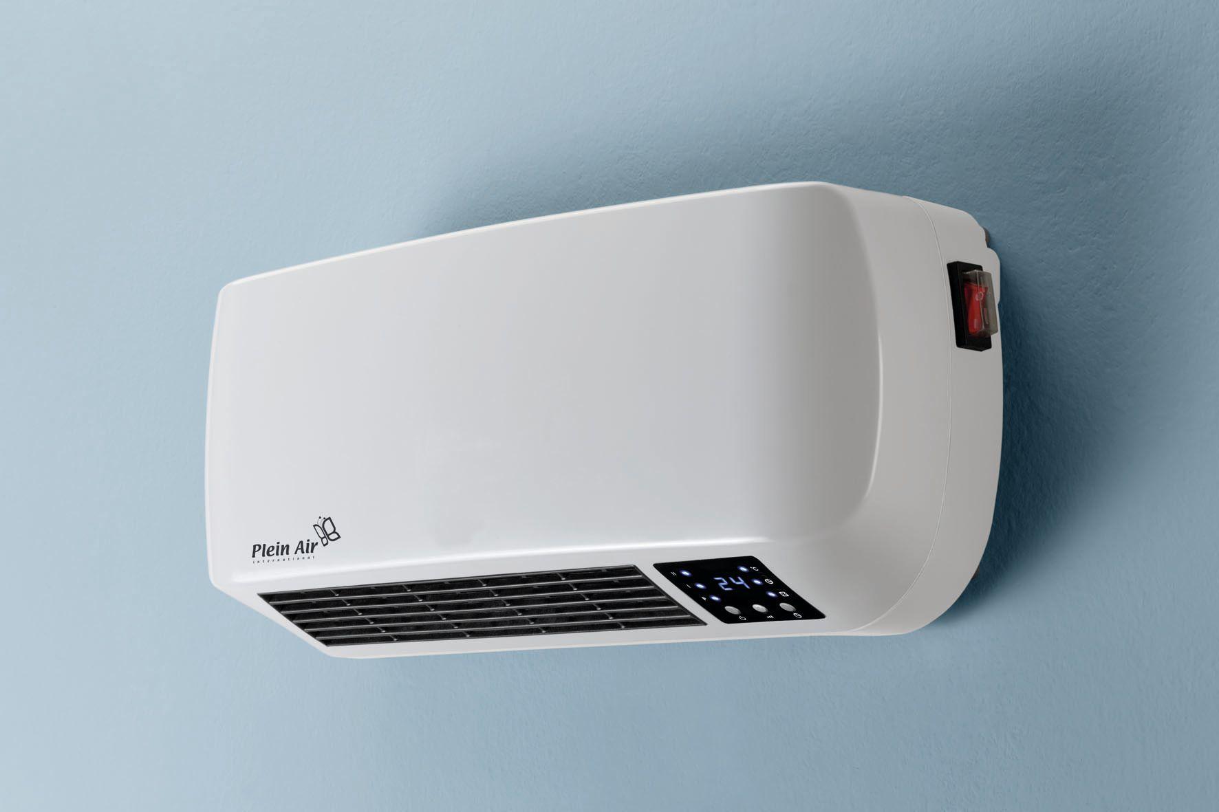 termoarredo ceramico da parete installato su muro azzurro per riscaldamento efficiente degli ambienti interni