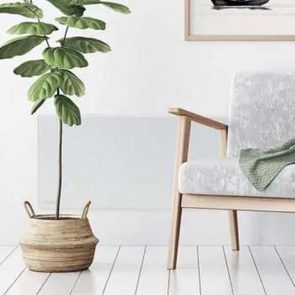 Radiatore elettrico norvegese installato in ambiente living moderno a parete